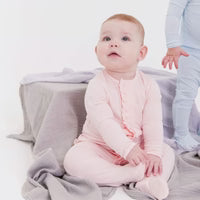 Load image into Gallery viewer, Magnetic Me- Magnetic Footie with Ruffle: Pink Dot Pink Modal (0-9m)