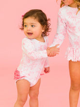 Load image into Gallery viewer, Rufflebutts- Baby Girls Bubblegum Pink Butterfly Garden Toile LS One Piece Rash Guard Swimsuit with Signature Rear Ruffles (0-24m)